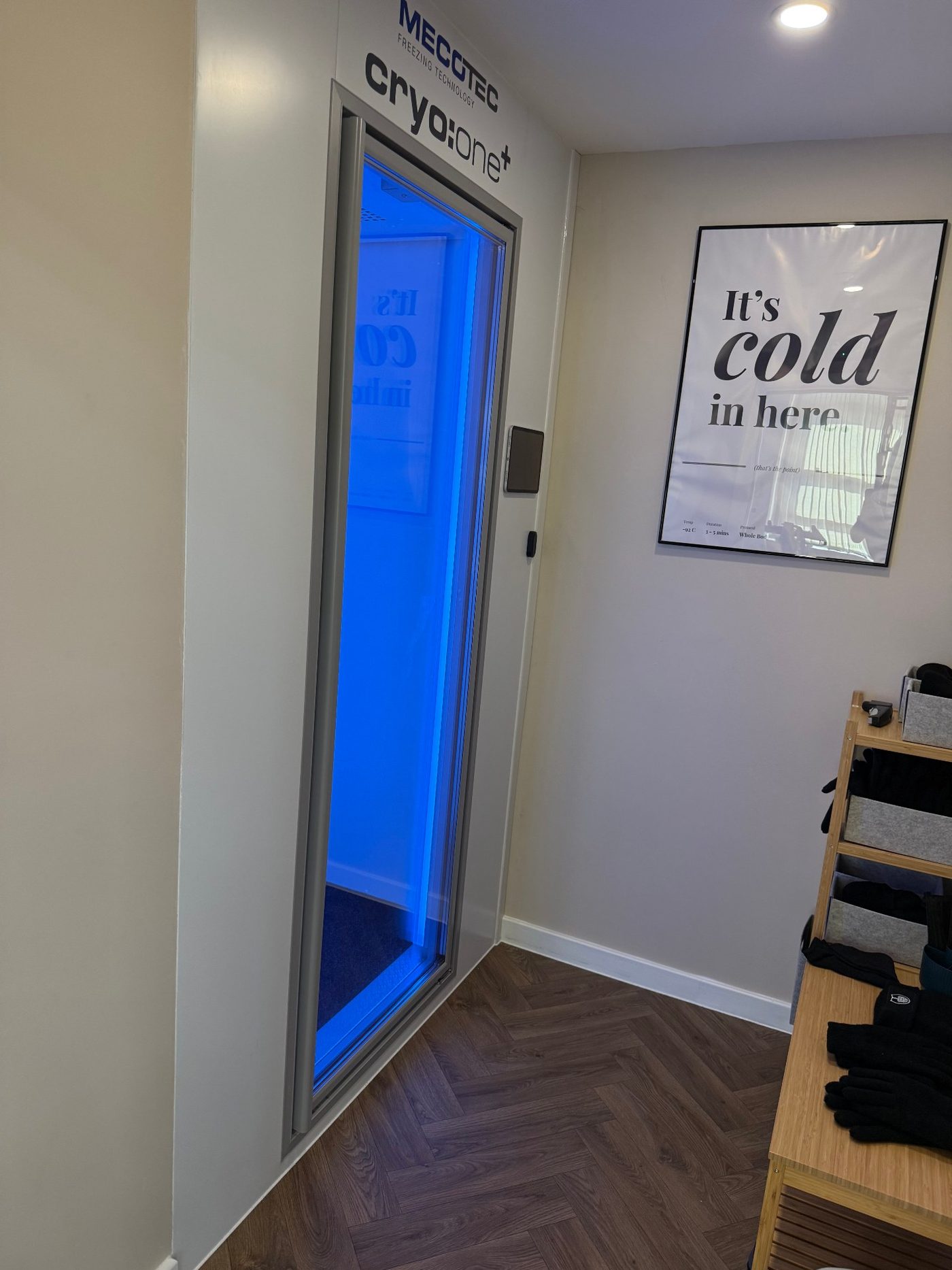 Person during a whole-body cryotherapy session in a cryo chamber